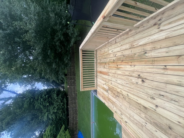 Poolside decking and railing detail by Pittman Construction