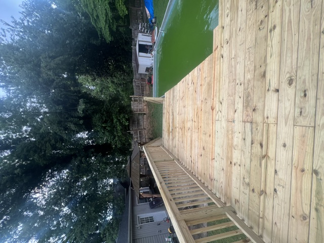 New deck walkway toward the pool built by Pittman Construction